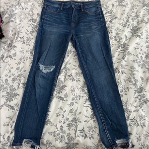 AE dark washed skinny jeans